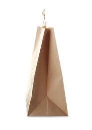 Photo of Empty paper shopping bag on white background