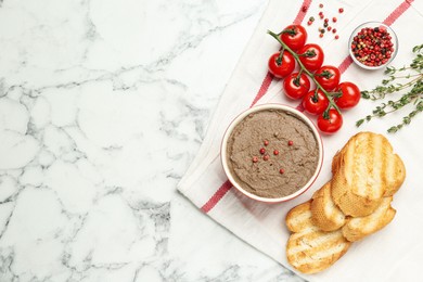 Flat lay composition with tasty liver pate on white marble table. Space for text