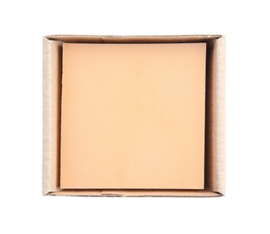 Hand made soap bar in cardboard package on white background, top view