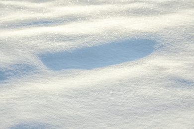 Beautiful snowdrift as background, closeup view. Winter weather