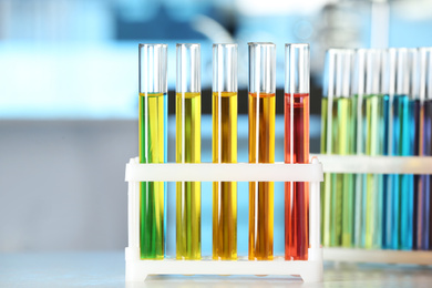 Test tubes with liquid samples on table. Laboratory analysis