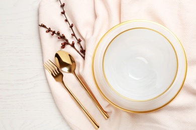 Photo of Stylish elegant table setting on wooden background, top view