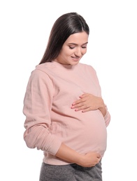 Young pregnant woman in casual clothes on white background