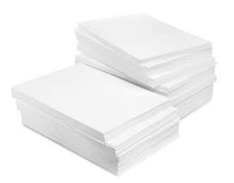 Stacks of paper sheets on white background