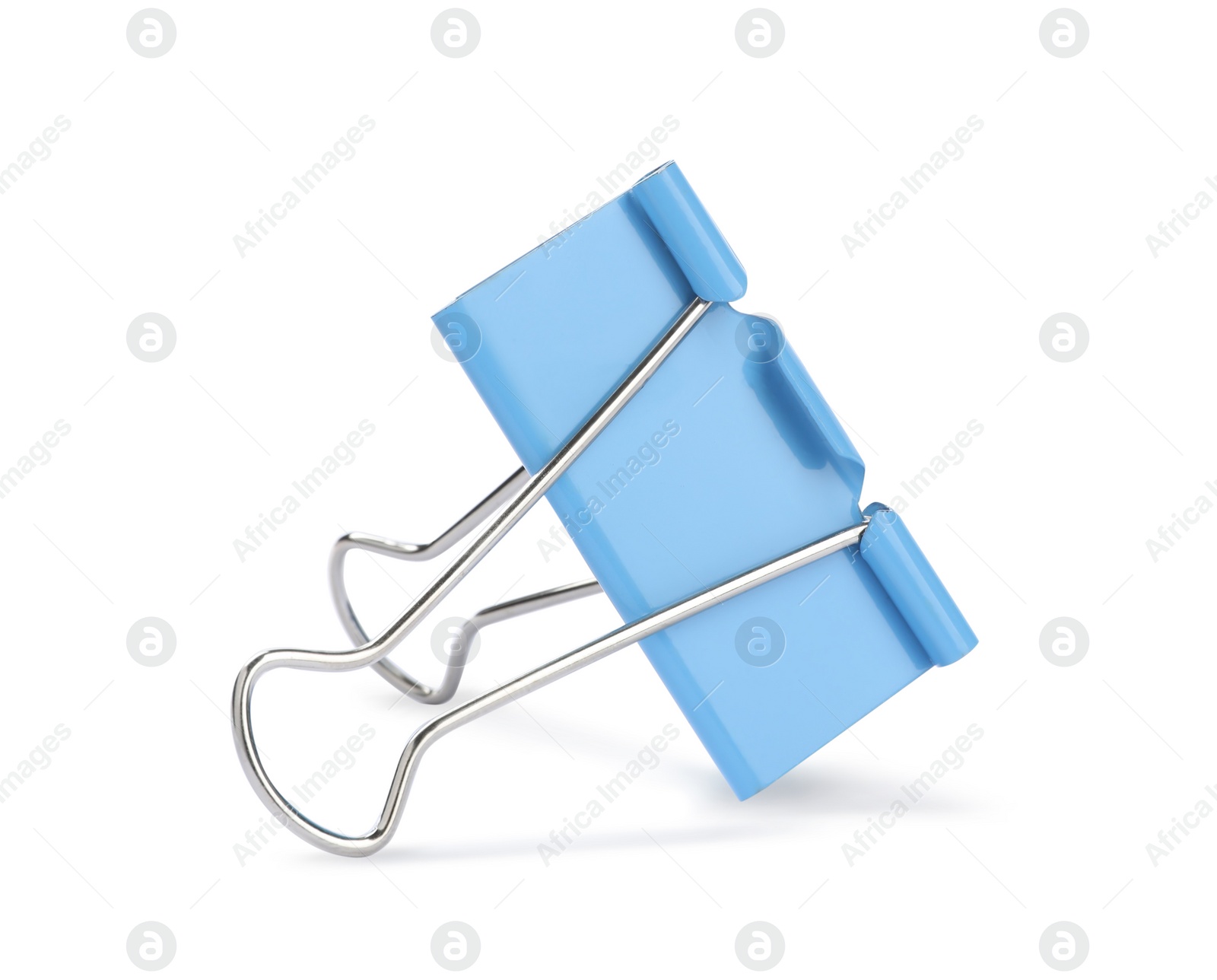 Photo of Light blue binder clip isolated on white. Stationery