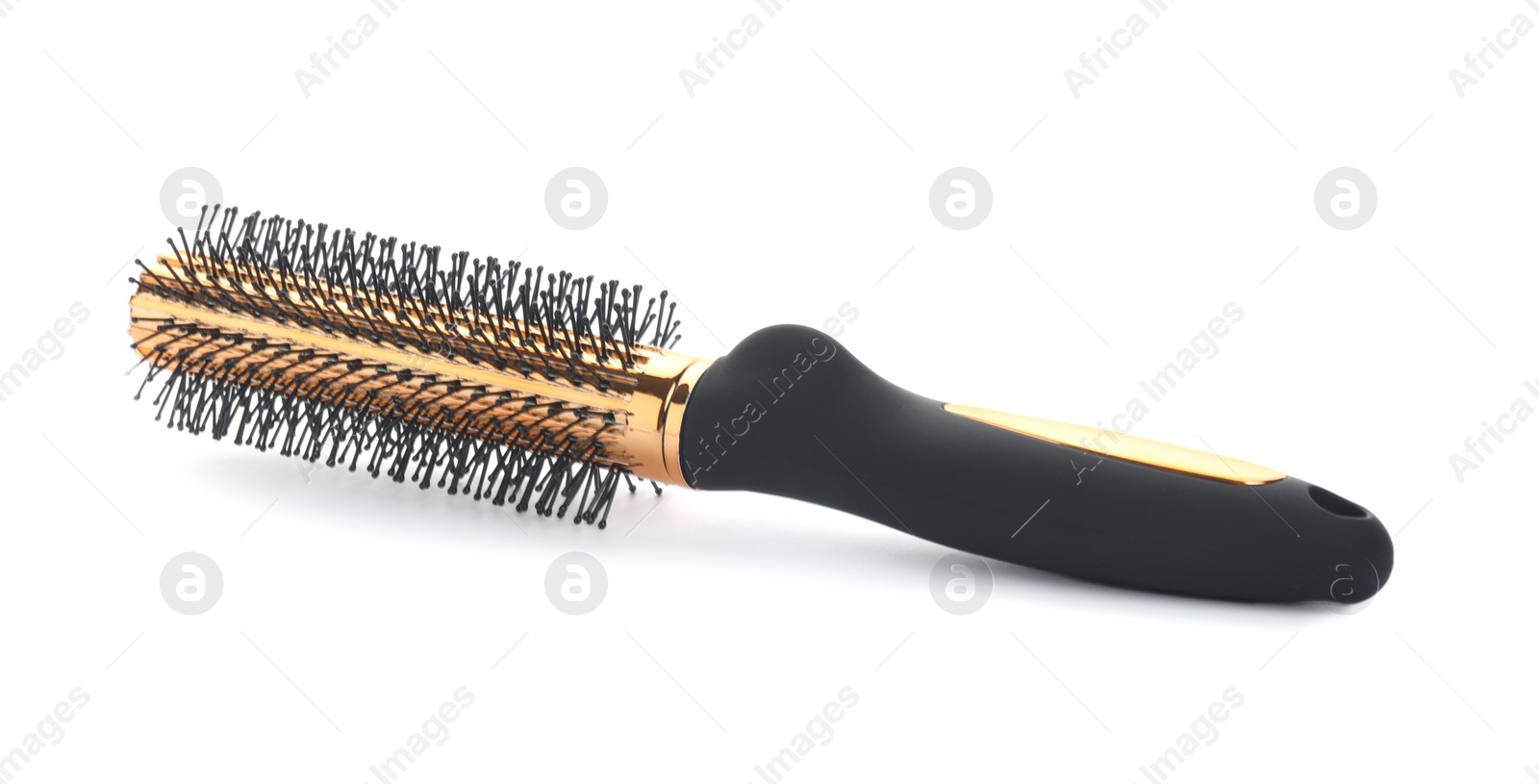 Photo of New round hair brush isolated on white