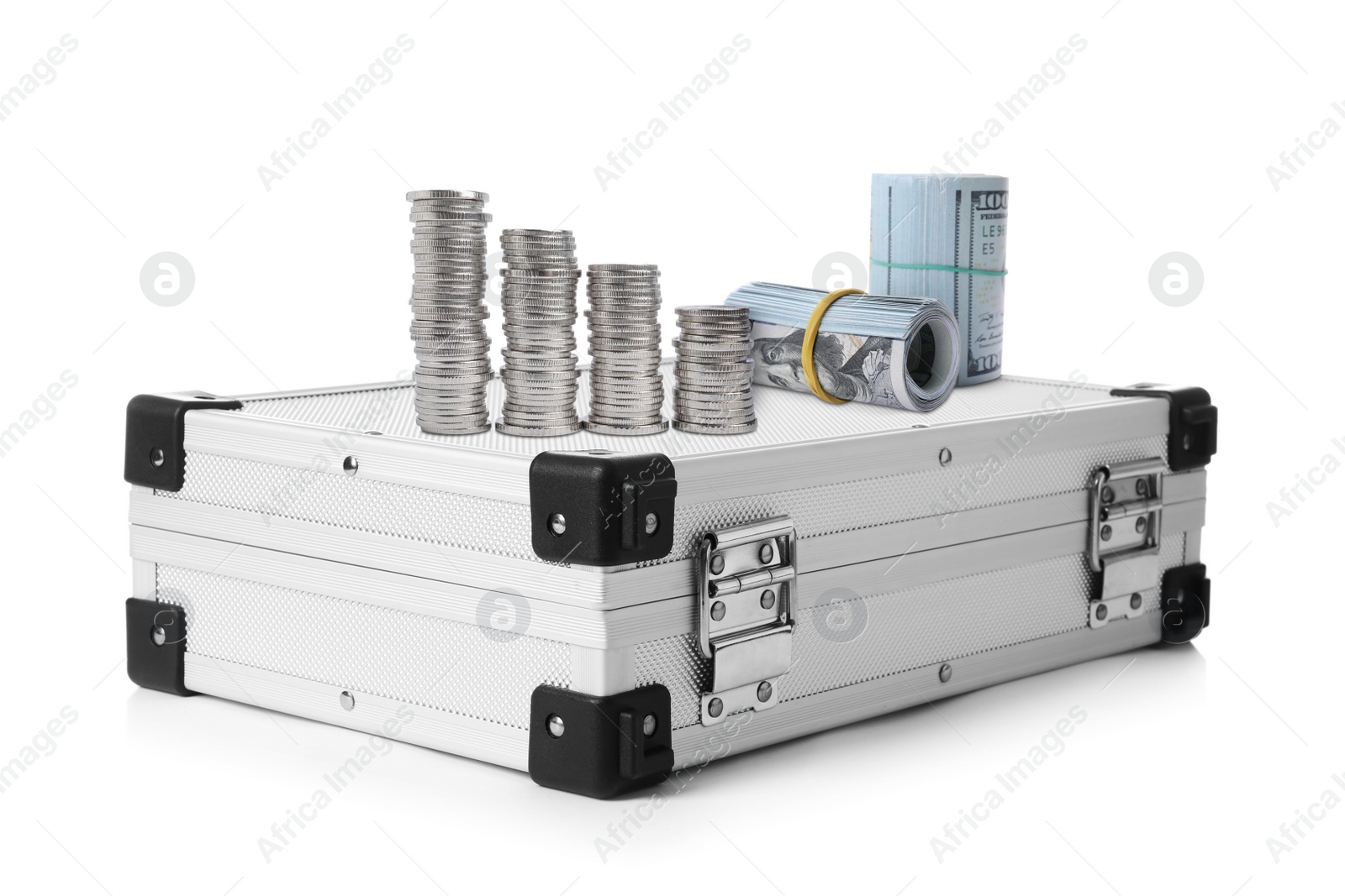 Image of Aluminum hard case, rolled dollar banknotes and stack of coins on white background