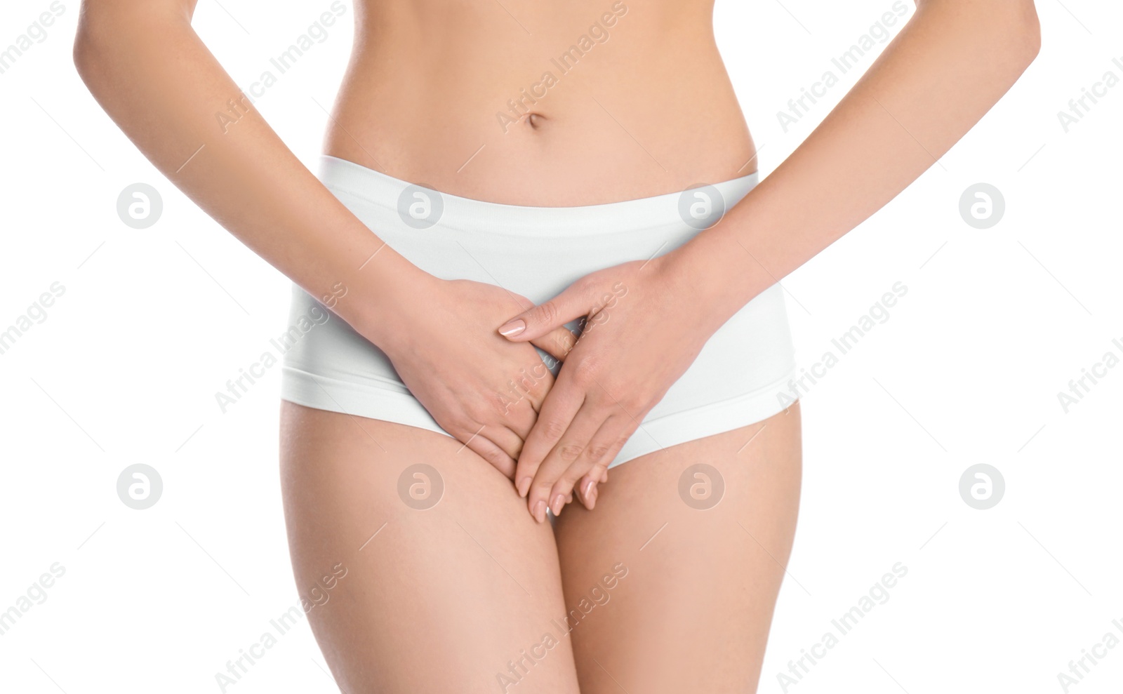 Photo of Young woman holding hands near underwear on white background. Gynecology