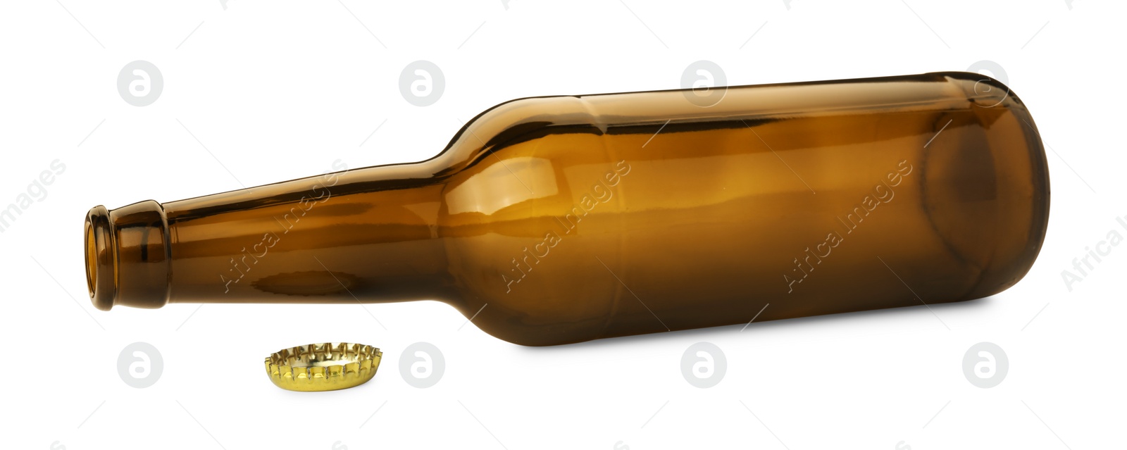 Photo of One empty brown beer bottle and cap isolated on white