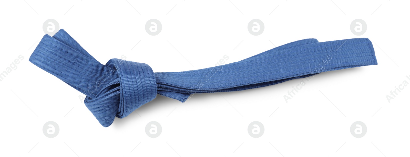 Photo of Blue karate belt isolated on white. Martial arts uniform
