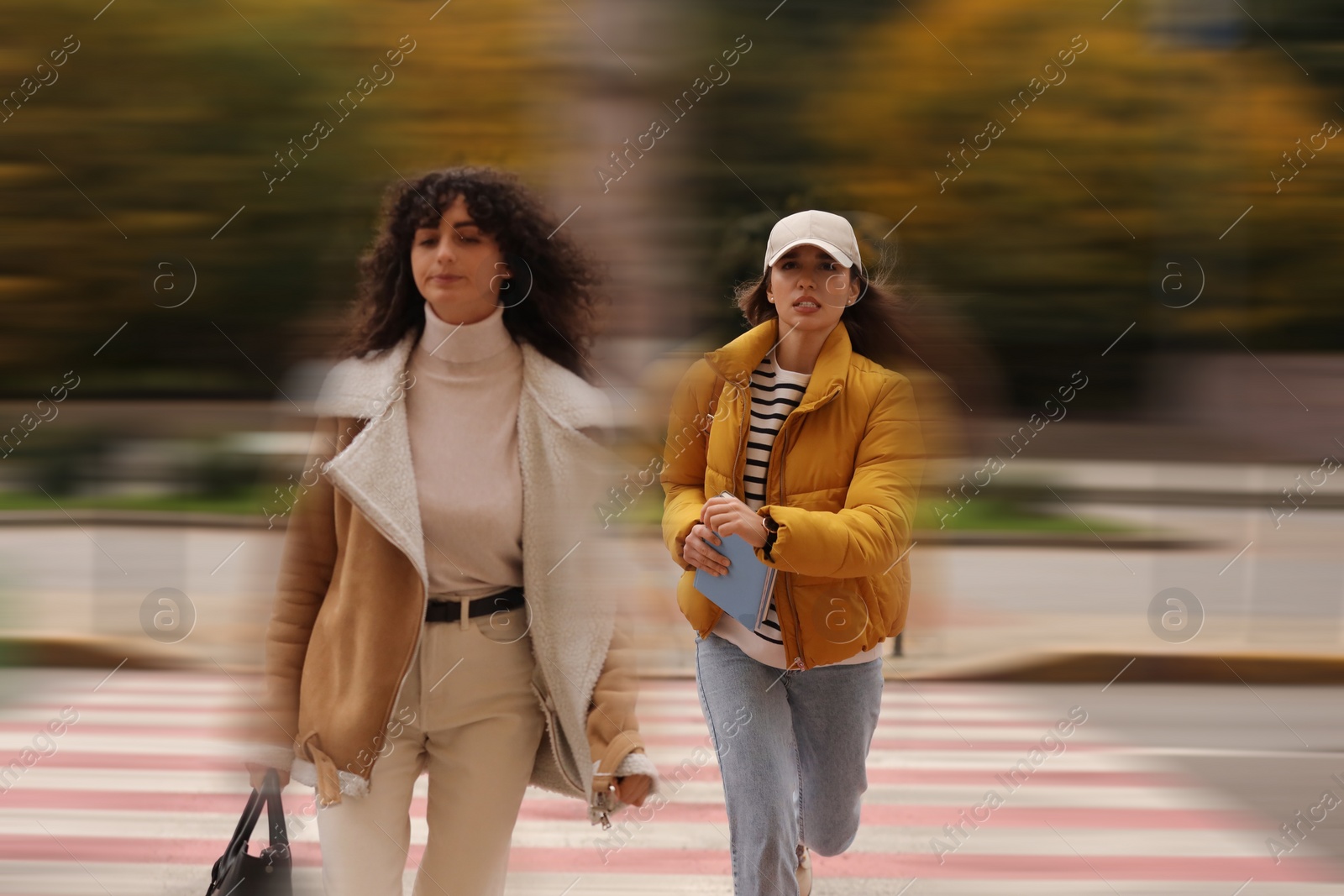 Image of Being late. Students running for class outdoors. Motion blur effect