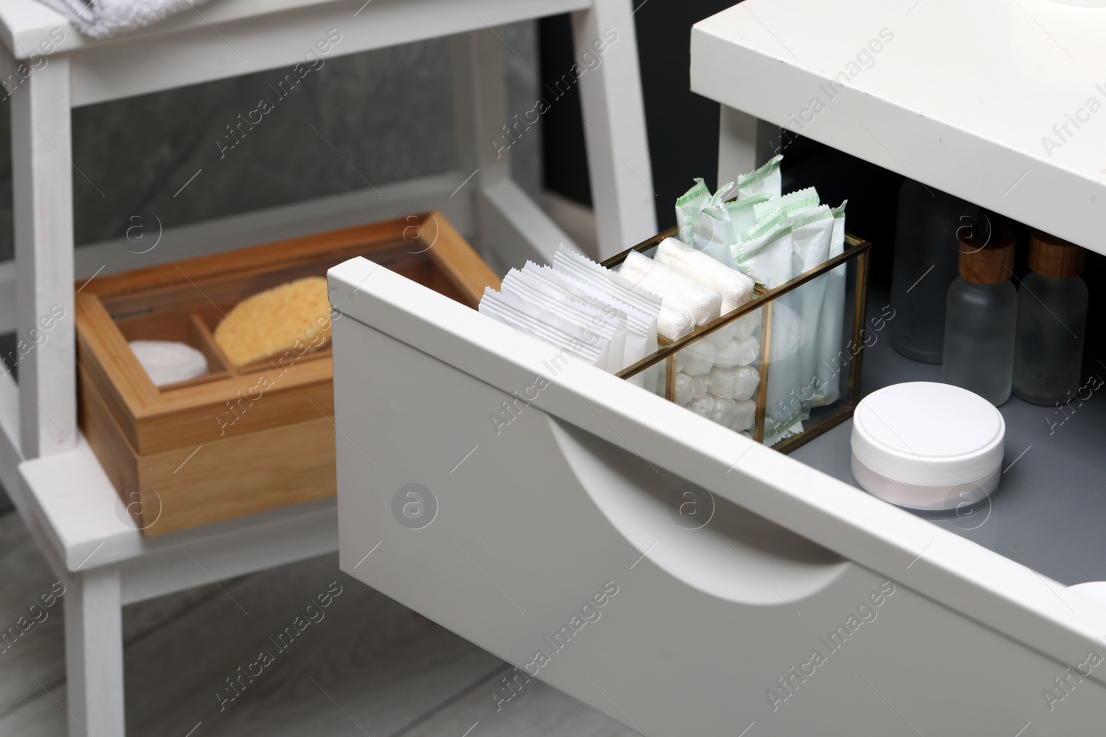 Photo of Storage of different feminine and personal care products in drawer indoors