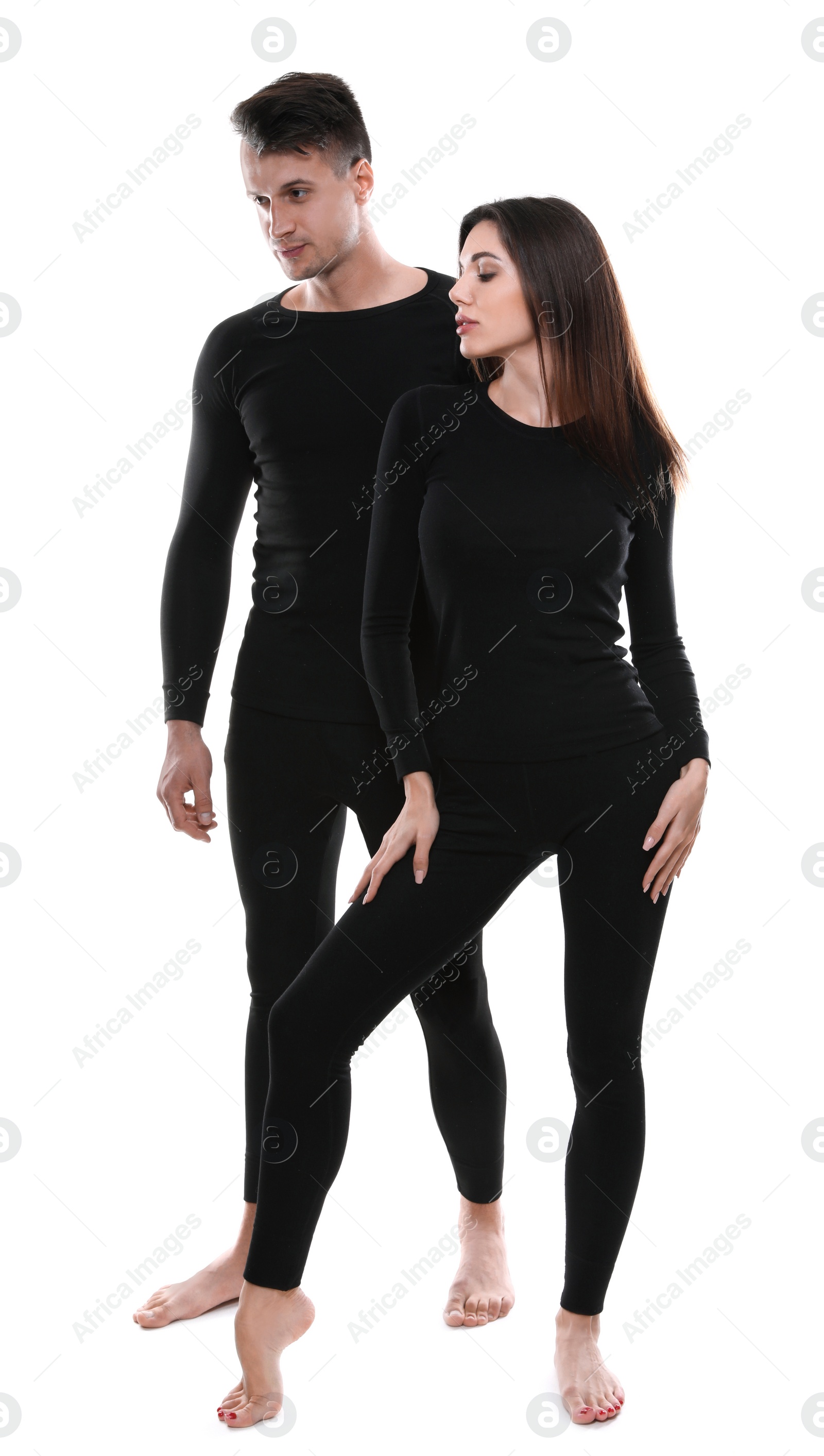 Photo of Couple wearing thermal underwear isolated on white