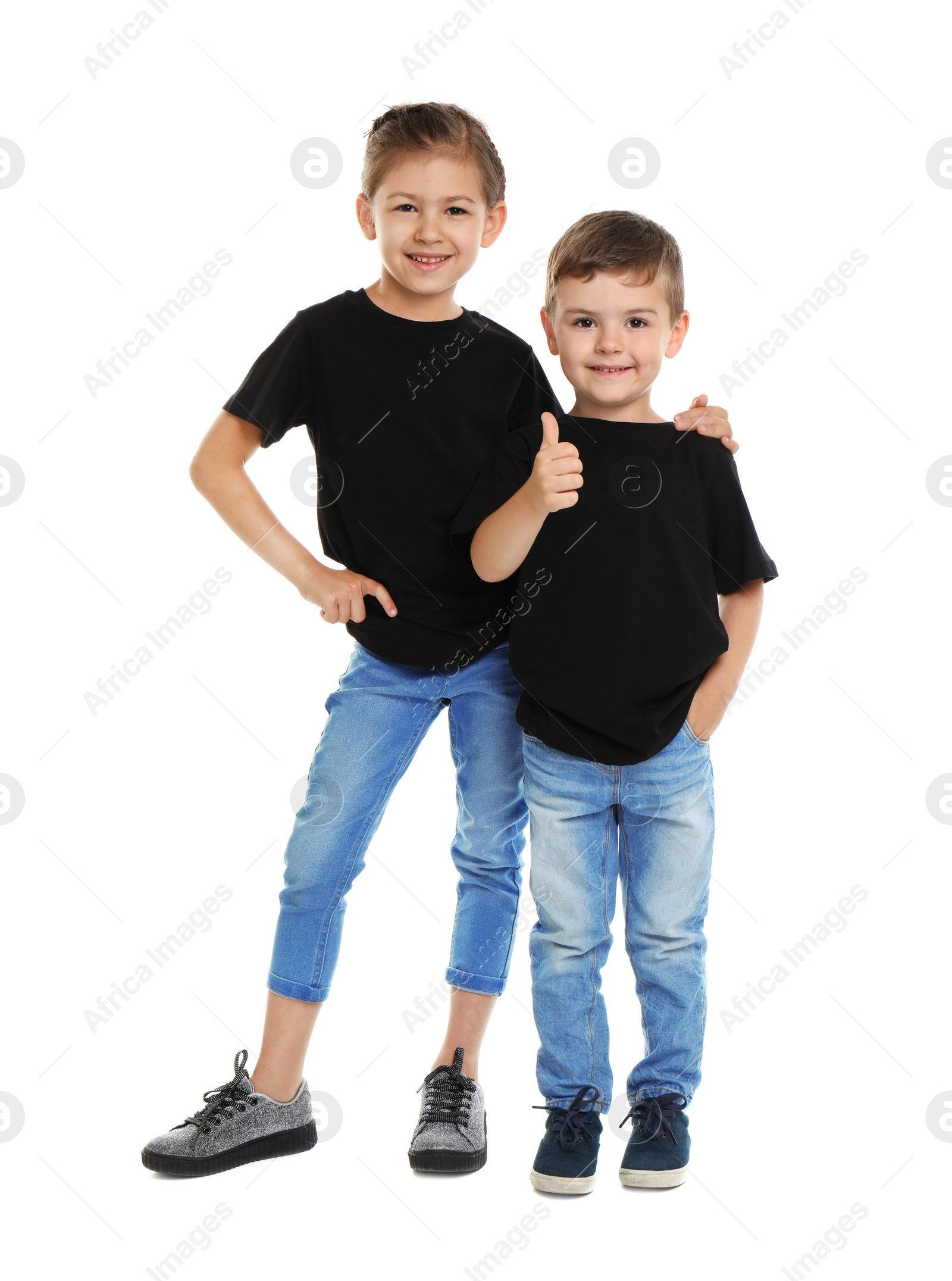 Photo of Little kids in t-shirts on white background. Mockup for design