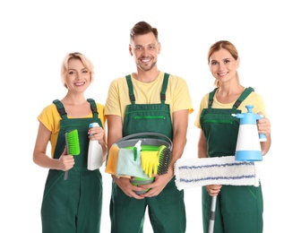 Team of janitors with cleaning supplies on white background