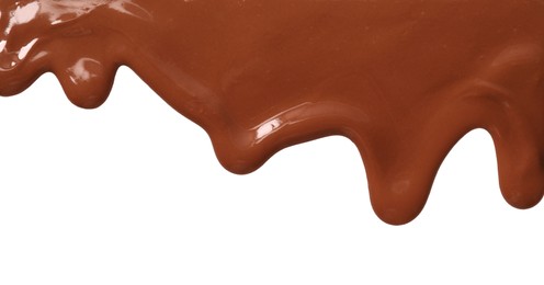 Tasty melted milk chocolate pouring down on white background