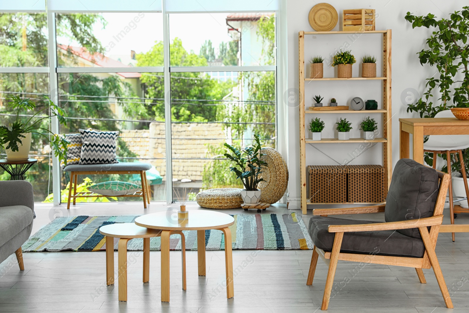 Photo of Modern living room interior with comfortable armchair