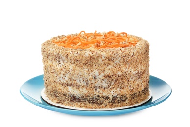 Dish with delicious carrot cake on white background