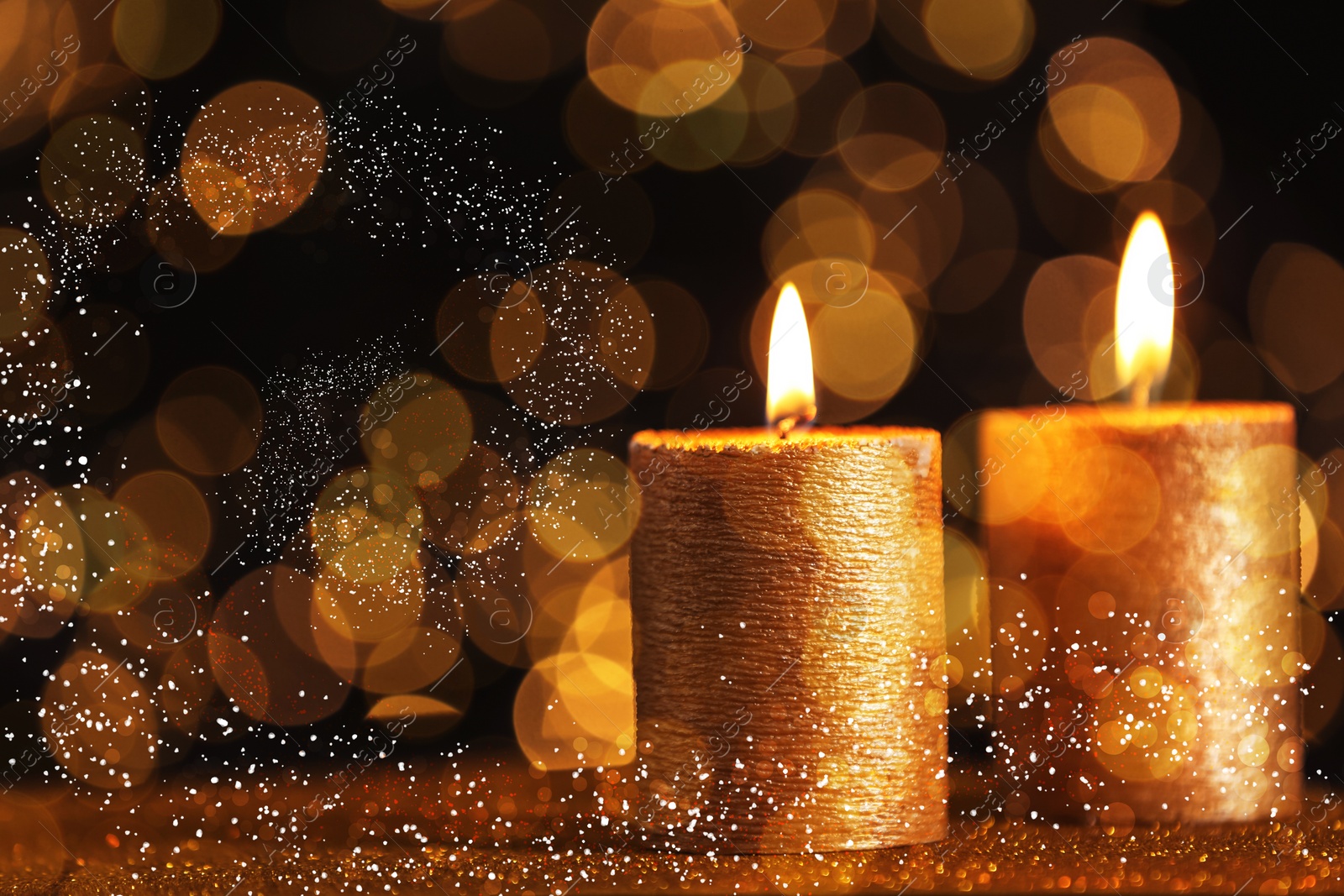 Image of Burning candles on dark background, bokeh effect