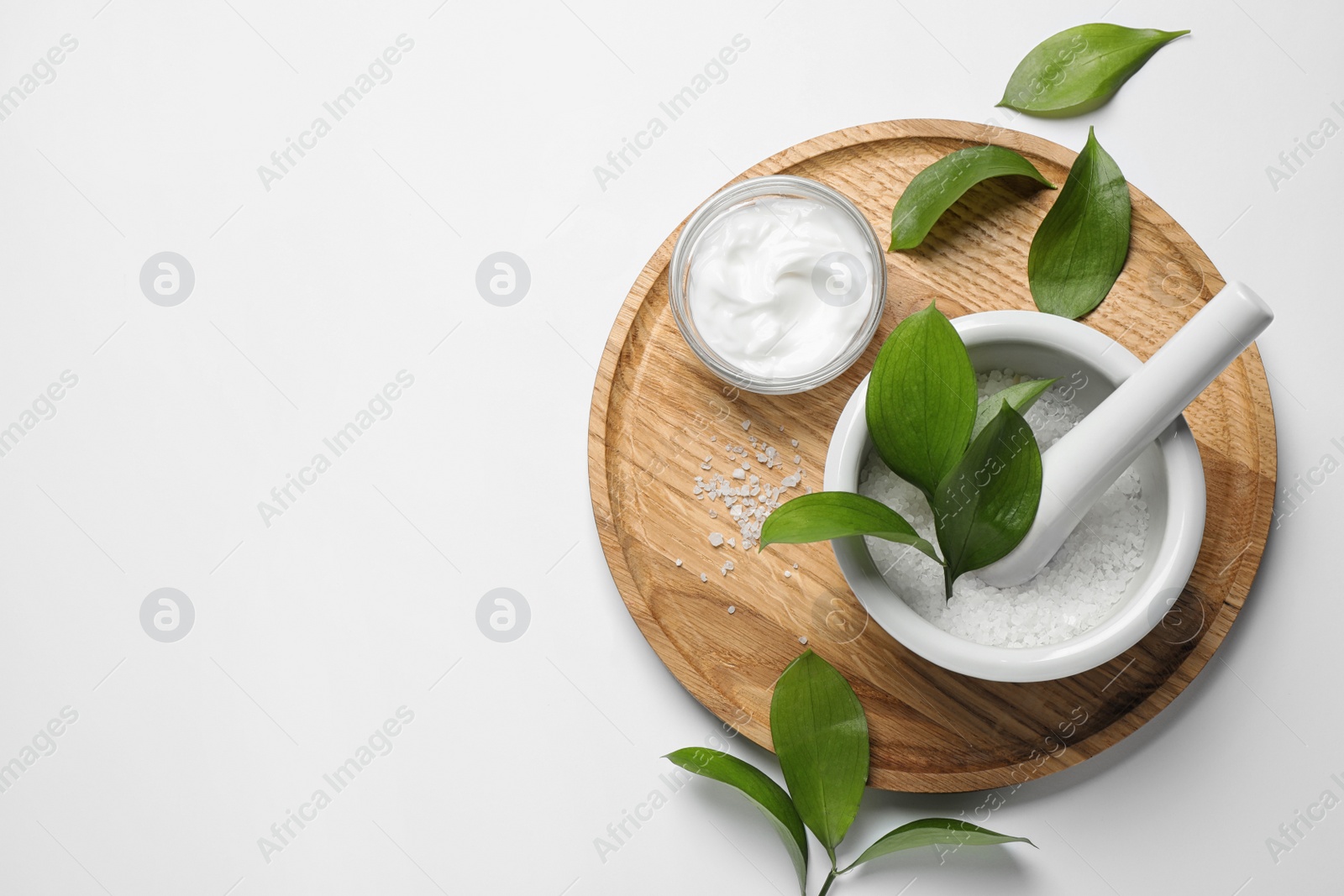 Photo of Composition with bath salt on white background, top view. Spa treatment