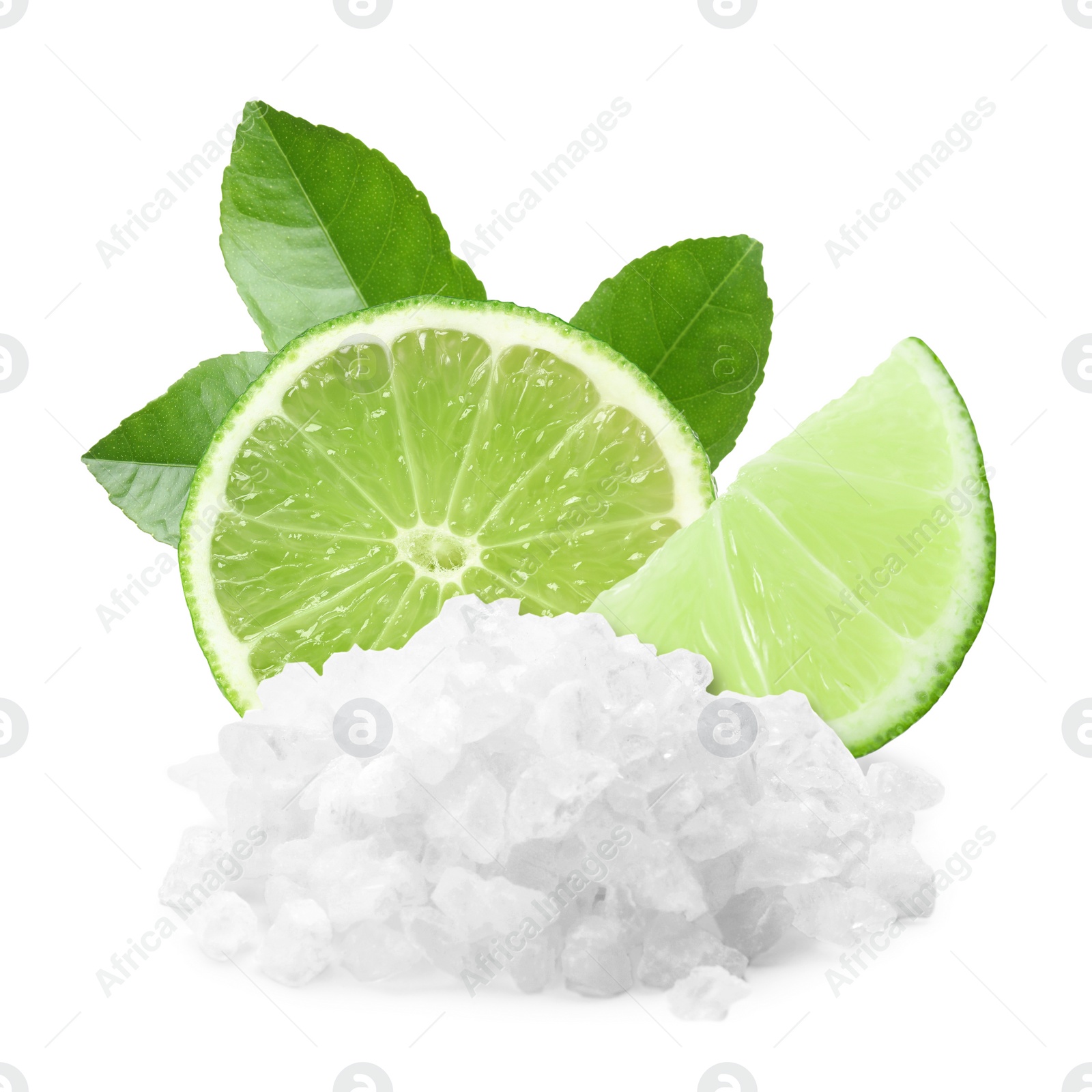 Image of Cut lime and salt isolated on white. Margarita cocktail ingredients