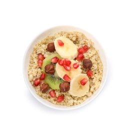 Photo of Bowl of quinoa porridge with hazelnuts, kiwi, banana and pomegranate seeds on white background, top view