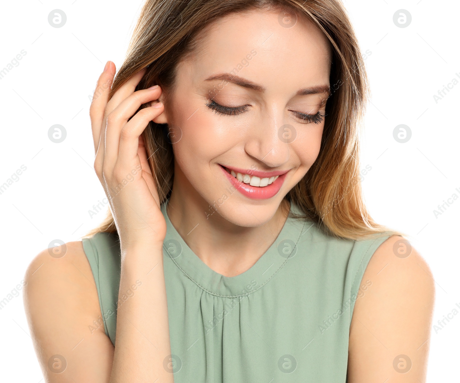 Photo of Portrait of young woman with beautiful face on white background, closeup