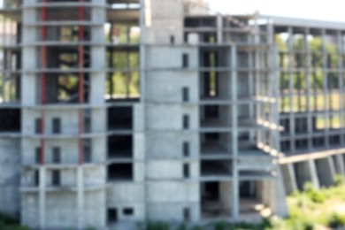 Blurred view of unfinished building on sunny day
