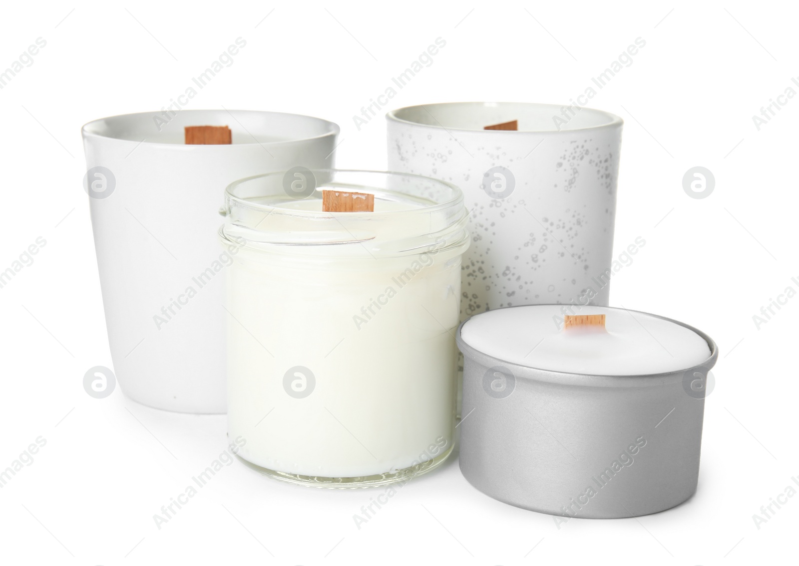 Photo of Beautiful candles with wooden wicks on white background