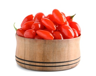 Fresh ripe goji berries in wooden bowl on white background