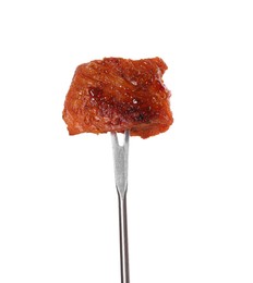 Fondue fork with piece of fried meat isolated on white