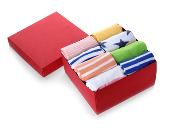 Box of child socks on white background