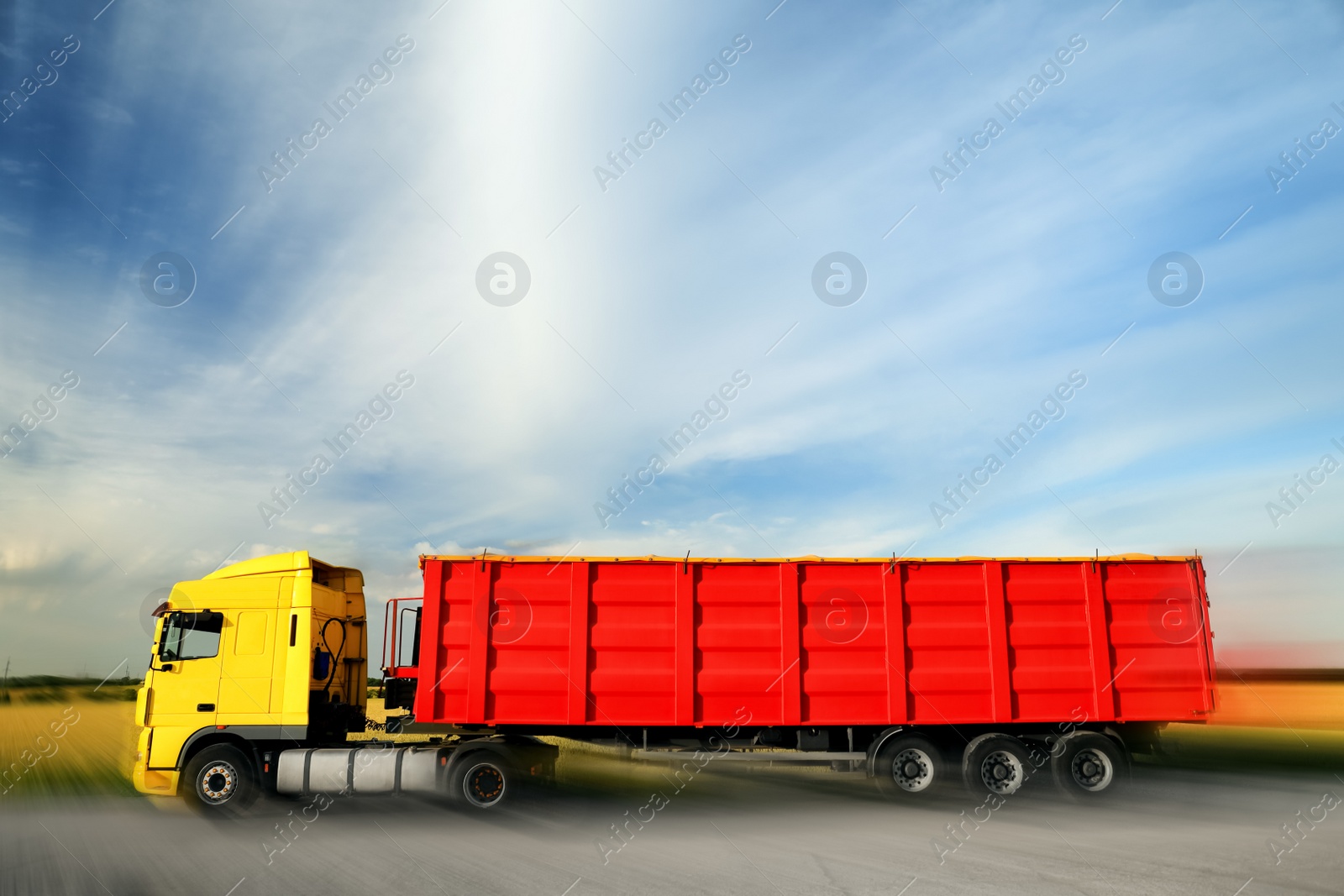 Image of Logistics concept. Truck on country road, motion blur effect 