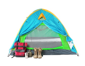 Photo of Tourist tent and camping equipment on white background