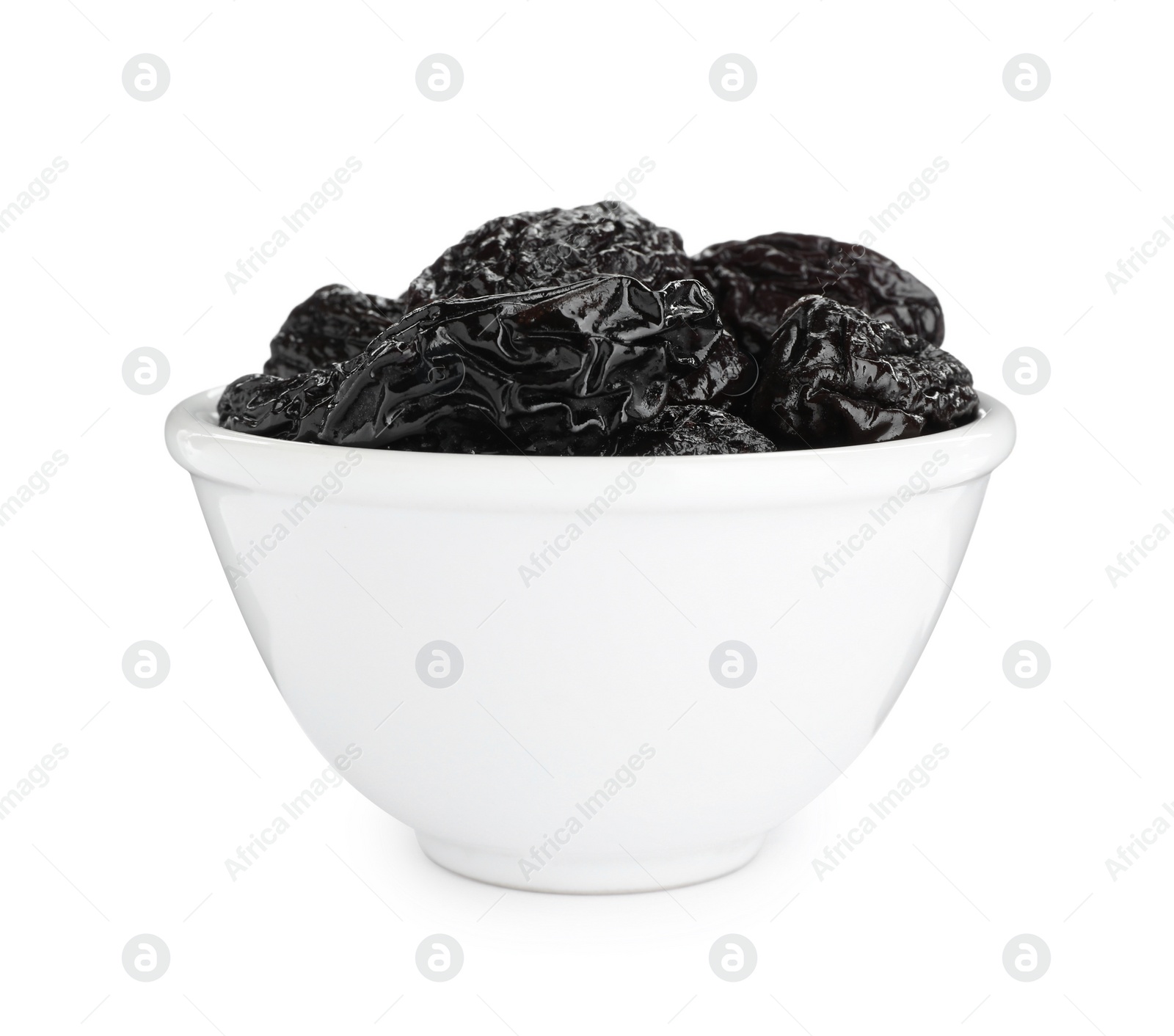 Photo of Bowl with sweet dried prunes isolated on white