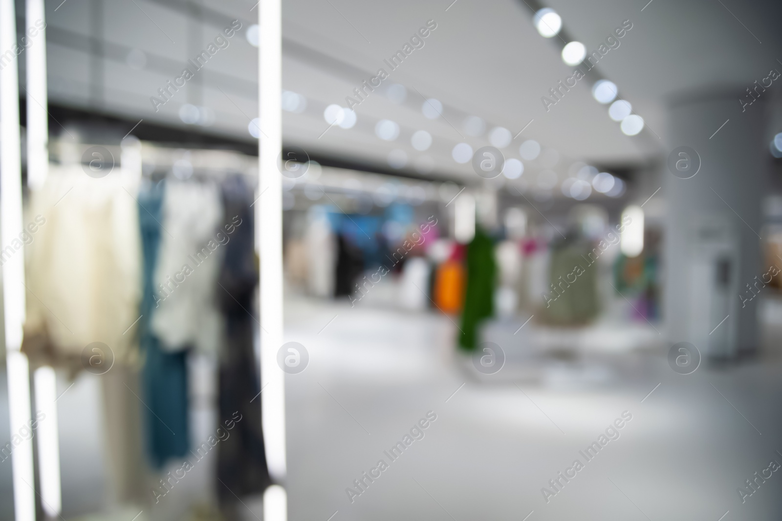 Photo of Blurred view of clothing store, bokeh effect