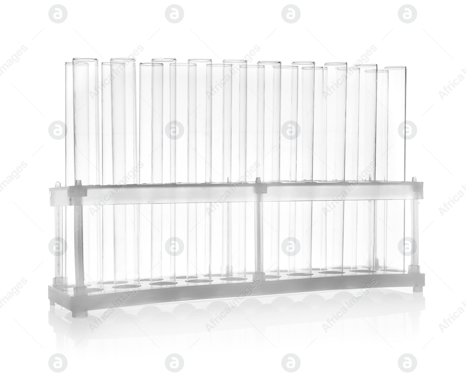 Photo of Holder with empty test tubes on white background. Laboratory glassware