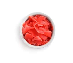 Photo of Piquant pickled ginger in bowl on white background, top view.  Delicious sauce condiment