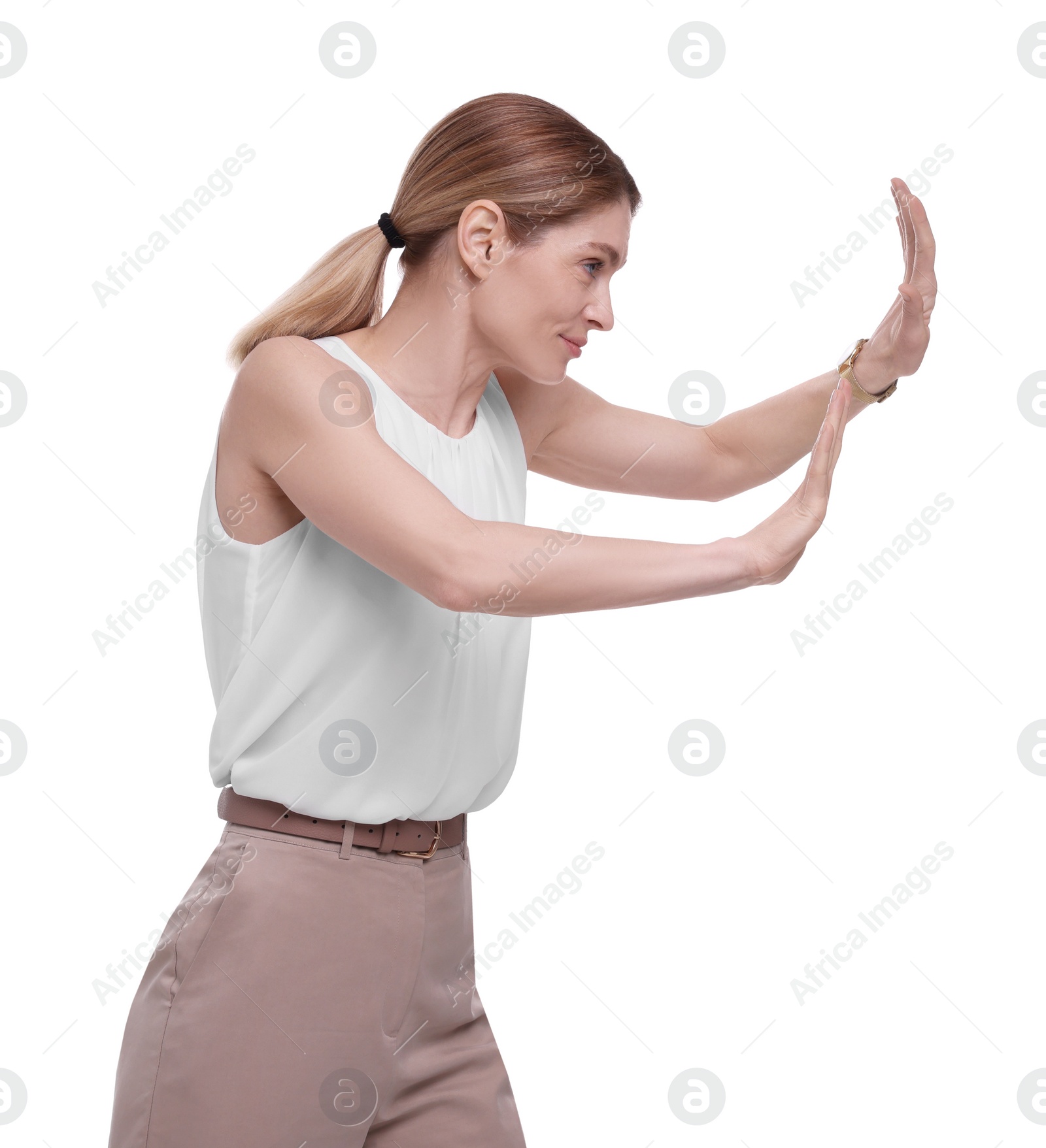 Photo of Beautiful businesswoman avoiding something on white background