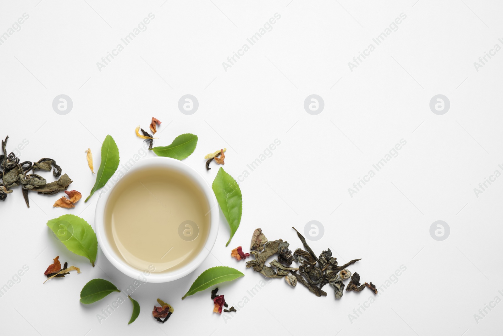 Photo of Flat lay composition with green tea on white background