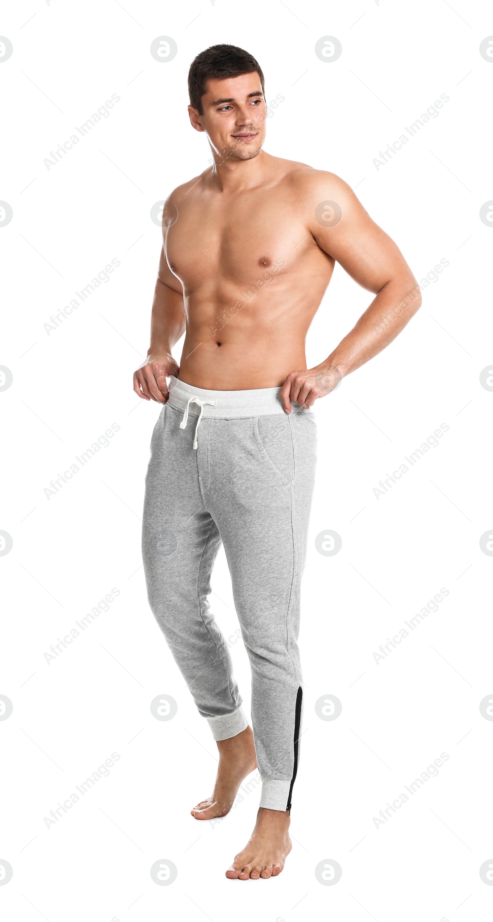 Photo of Man with sexy body on white background