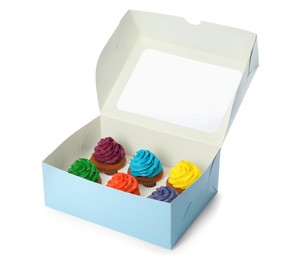 Photo of Box with different cupcakes on white background