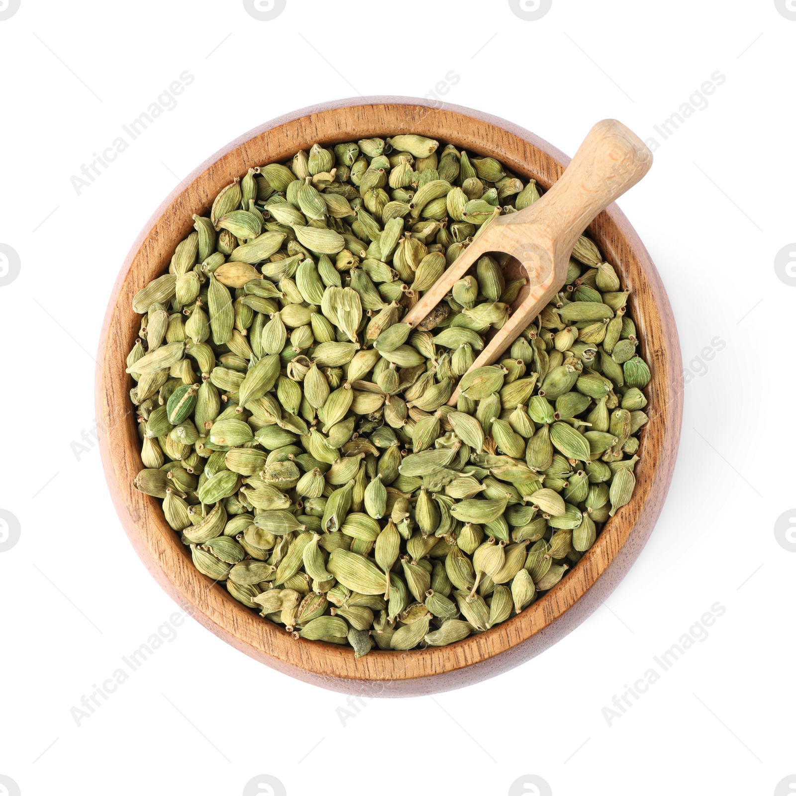 Photo of Wooden bowl and scoop with dry cardamom seeds isolated on white, top view