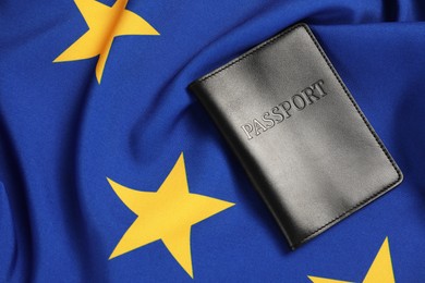 Photo of Passport on flag of European Union, top view. Space for text