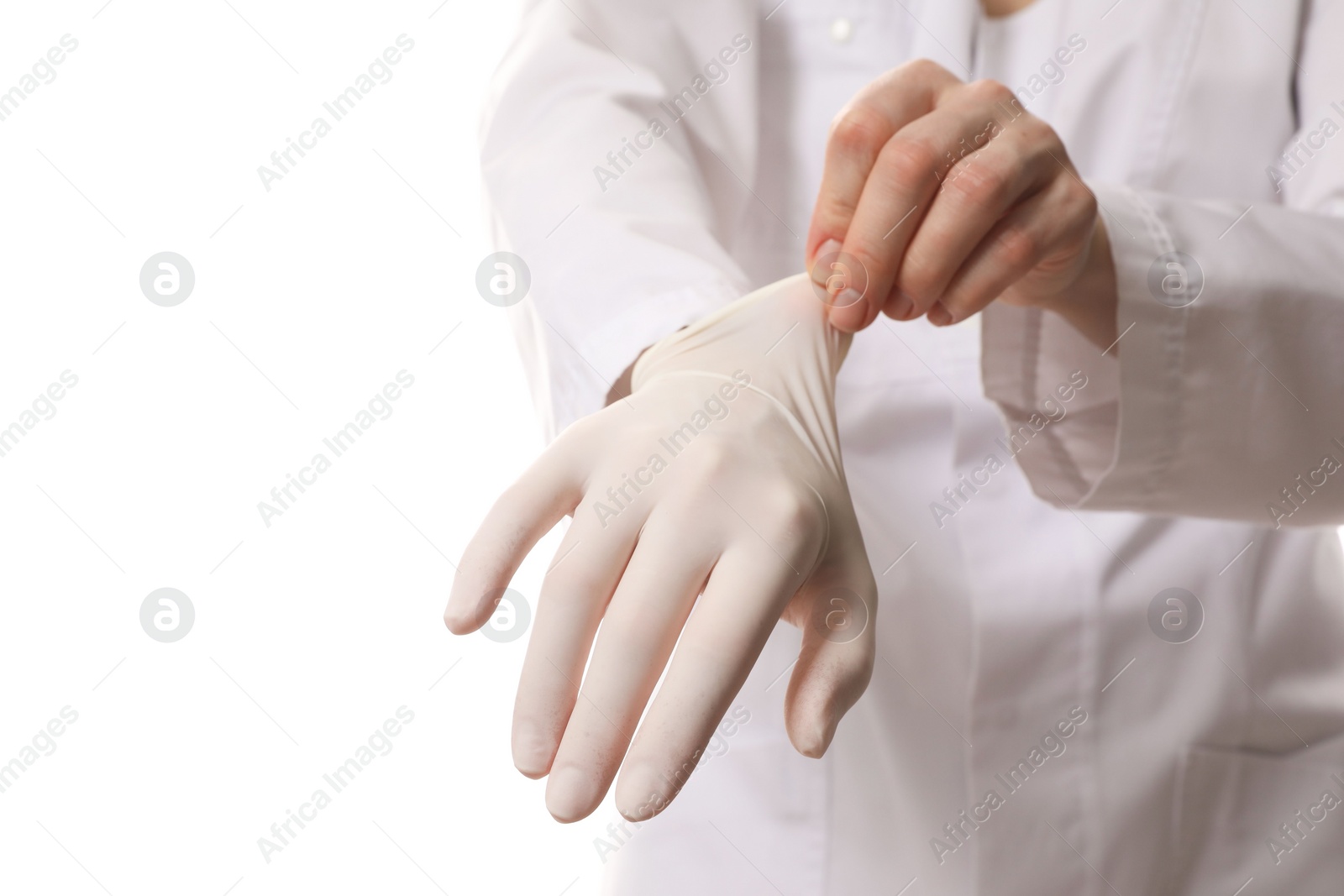 Photo of Doctor wearing medical gloves on white background, selective focus