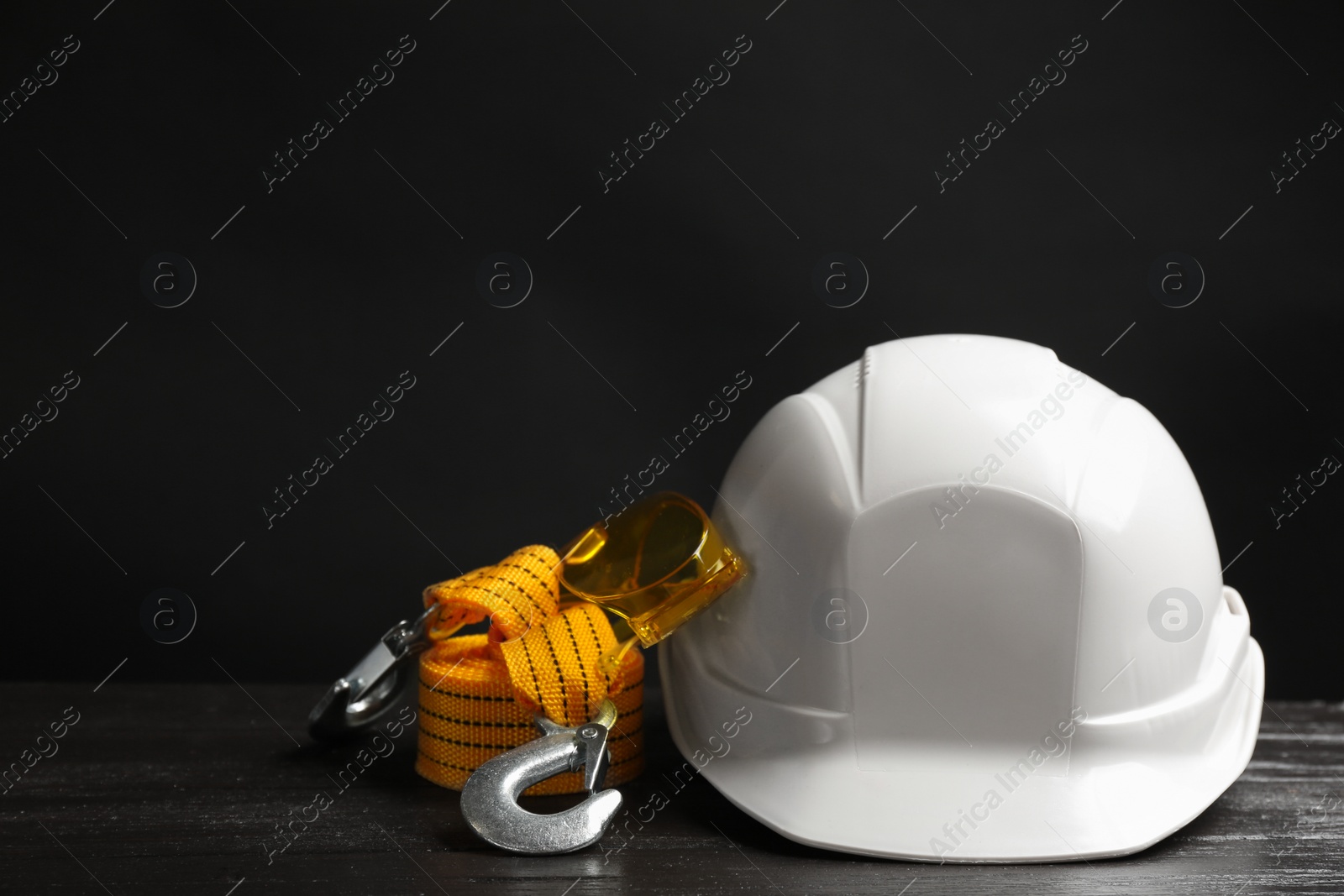 Photo of Composition with safety equipment on table. Space for text