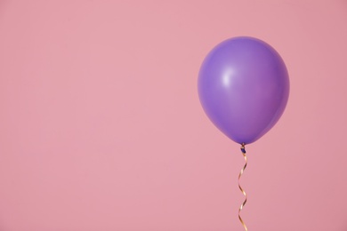 Photo of Bright balloon on color background, space for text. Celebration time