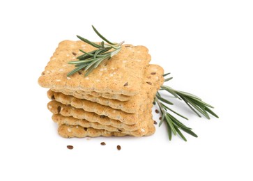 Photo of Stack of cereal crackers with flax, sesame seeds and rosemary isolated on white