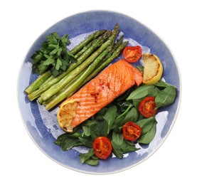 Photo of Tasty grilled salmon with tomatoes, asparagus, lemon and basil isolated on white, top view