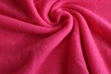 Photo of Beautiful pink fabric as background, closeup view